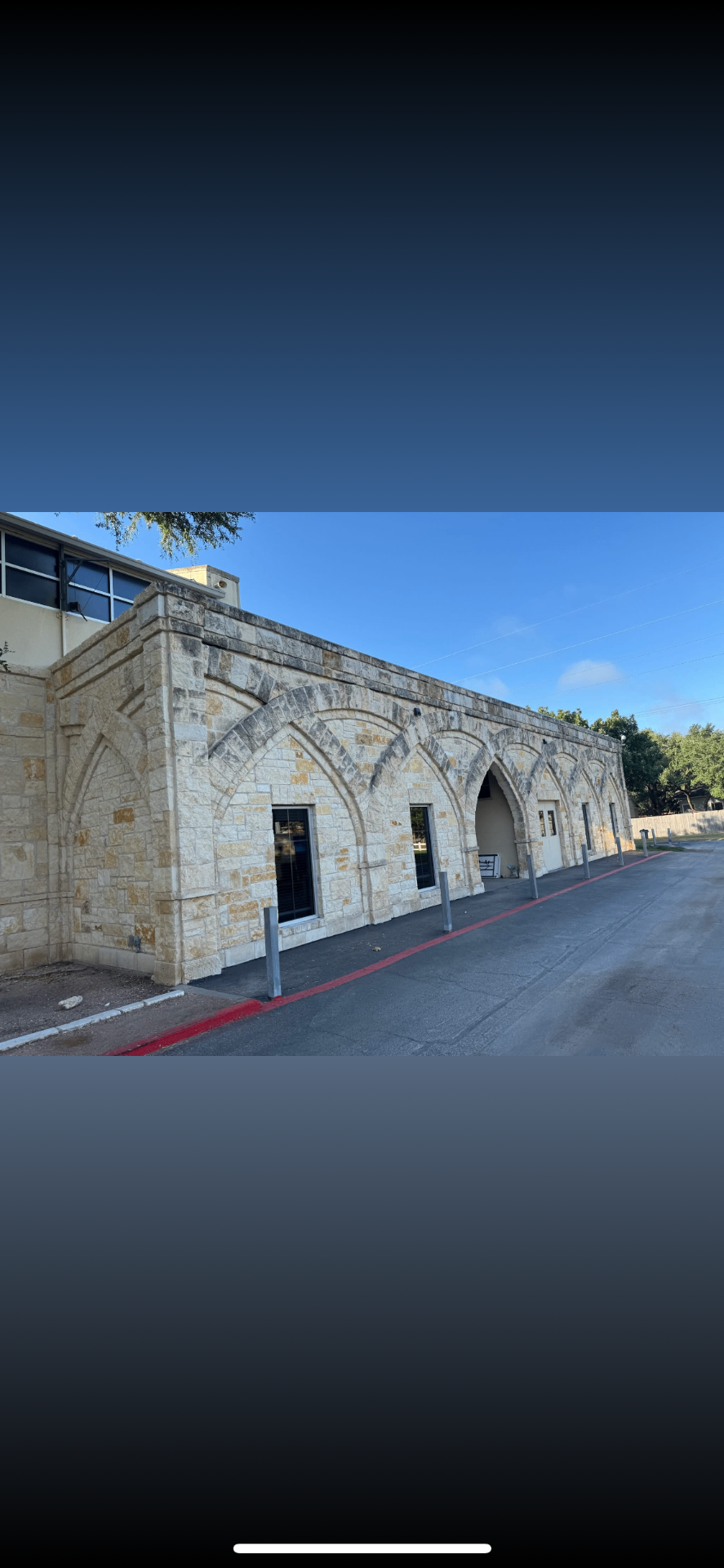 Commercial stone building — before cleaning in Pontotoc, MS