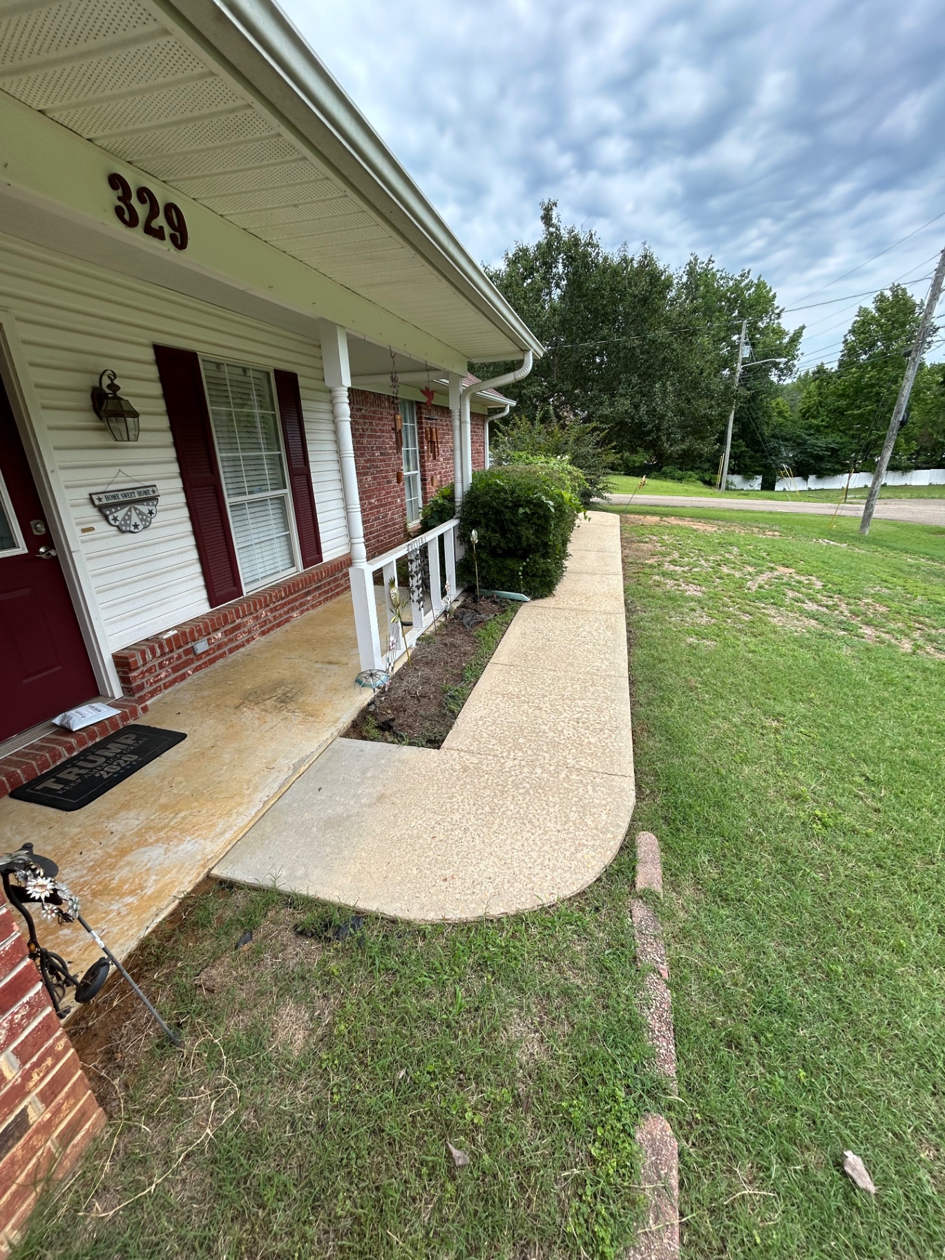 Walkway & porch concrete — after cleaning in Pontotoc, MS